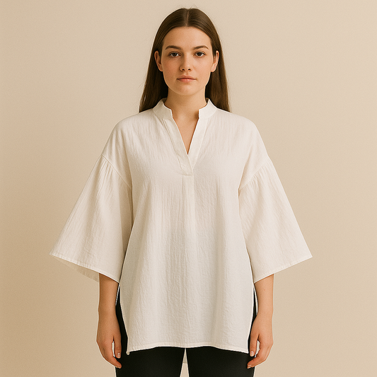 Biała tunika z szerokimi rękawami