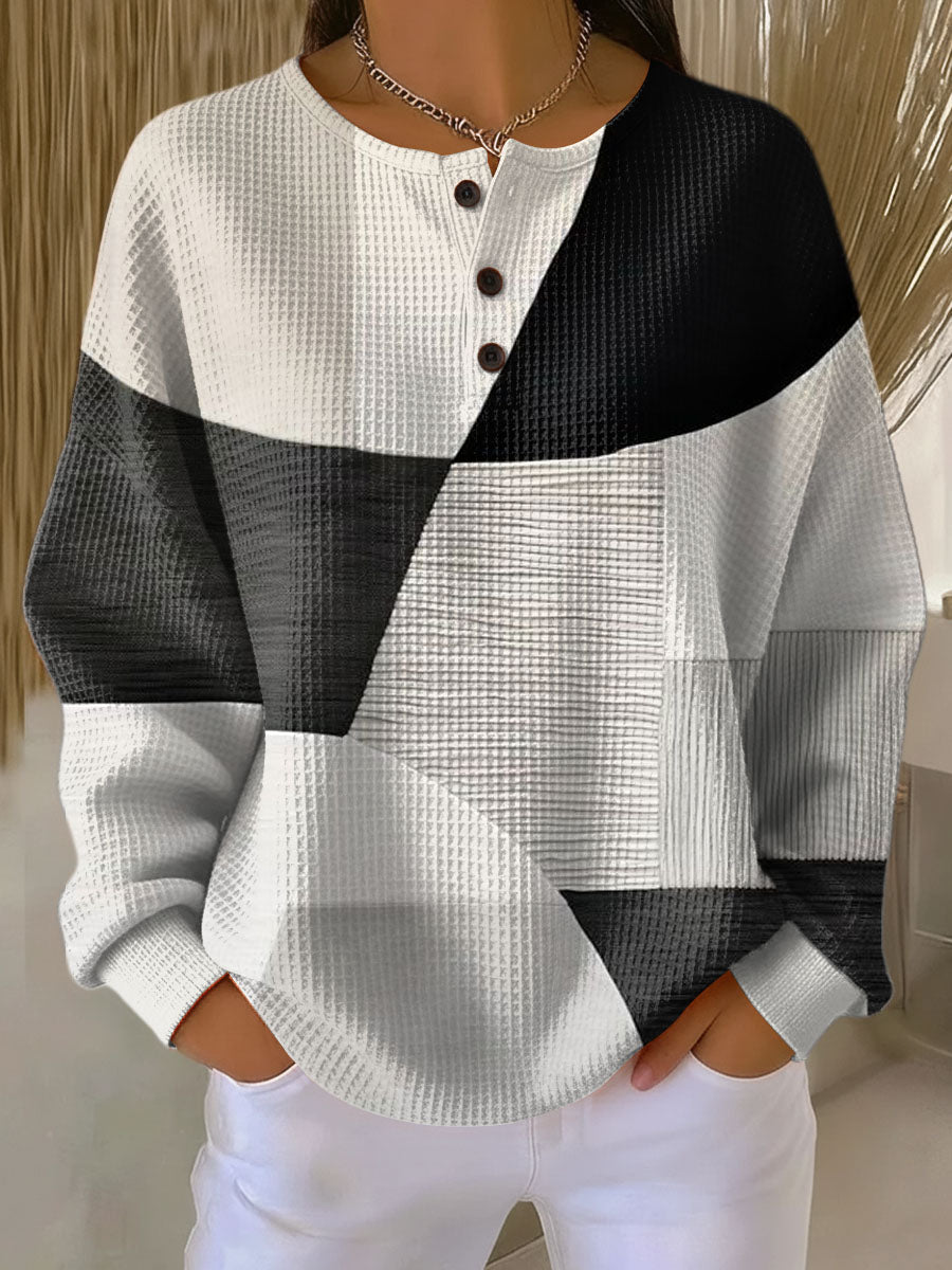 Lena – Damska bluza z geometrycznym wzorem i listwą guzikową przy dekolcie