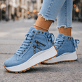 Sneaker damskie z wysokim krojem i bocznymi detalami - 1 - Livia-Moda