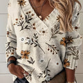 Pullover damski w kwiaty z dekoltem V i luźnym krojem - 1 - Livia-Moda