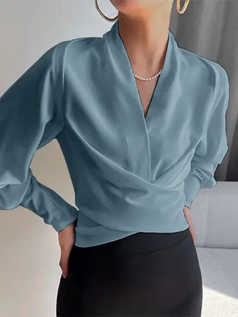 Bluzka damska z efektem kopertowym i długimi rękawami - 1 - Livia-Moda