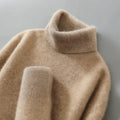 Pullover damski z golfem i luźnym krojem, dostępny w różnych kolorach - 1 - Livia-Moda
