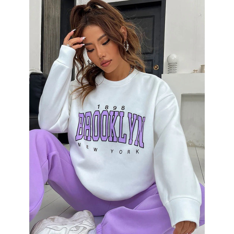 Bluza damska z nadrukiem Brooklyn i luźnym krojem - 5 - Livia-Moda