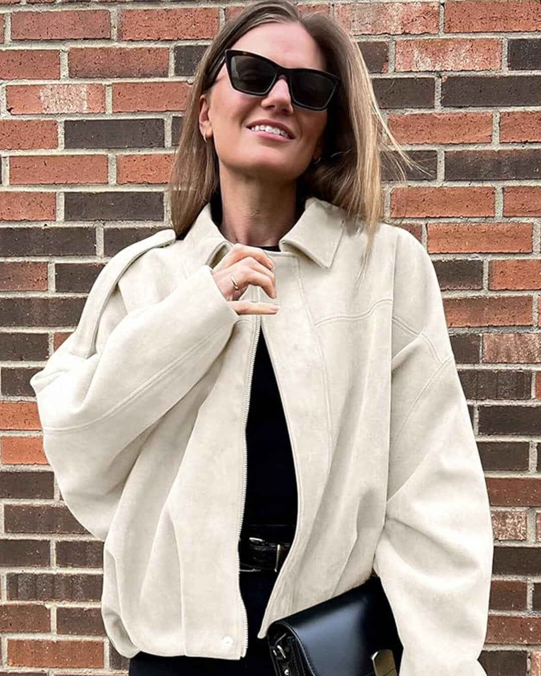Kurtka damska oversize z strukturalnym kołnierzem i kieszeniami - 15 - Livia-Moda