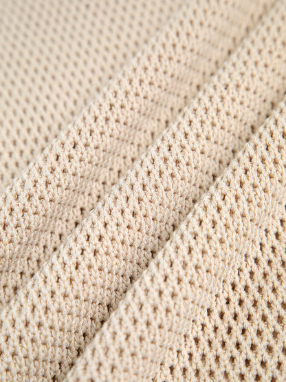 Laura – Ażurowy top bez rękawów o dzianinowej fakturze