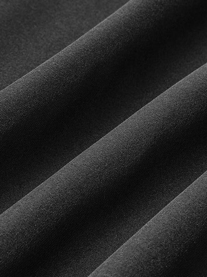 Luciana – Długa elegancka sukienka z wysokim kołnierzem i wycięciami