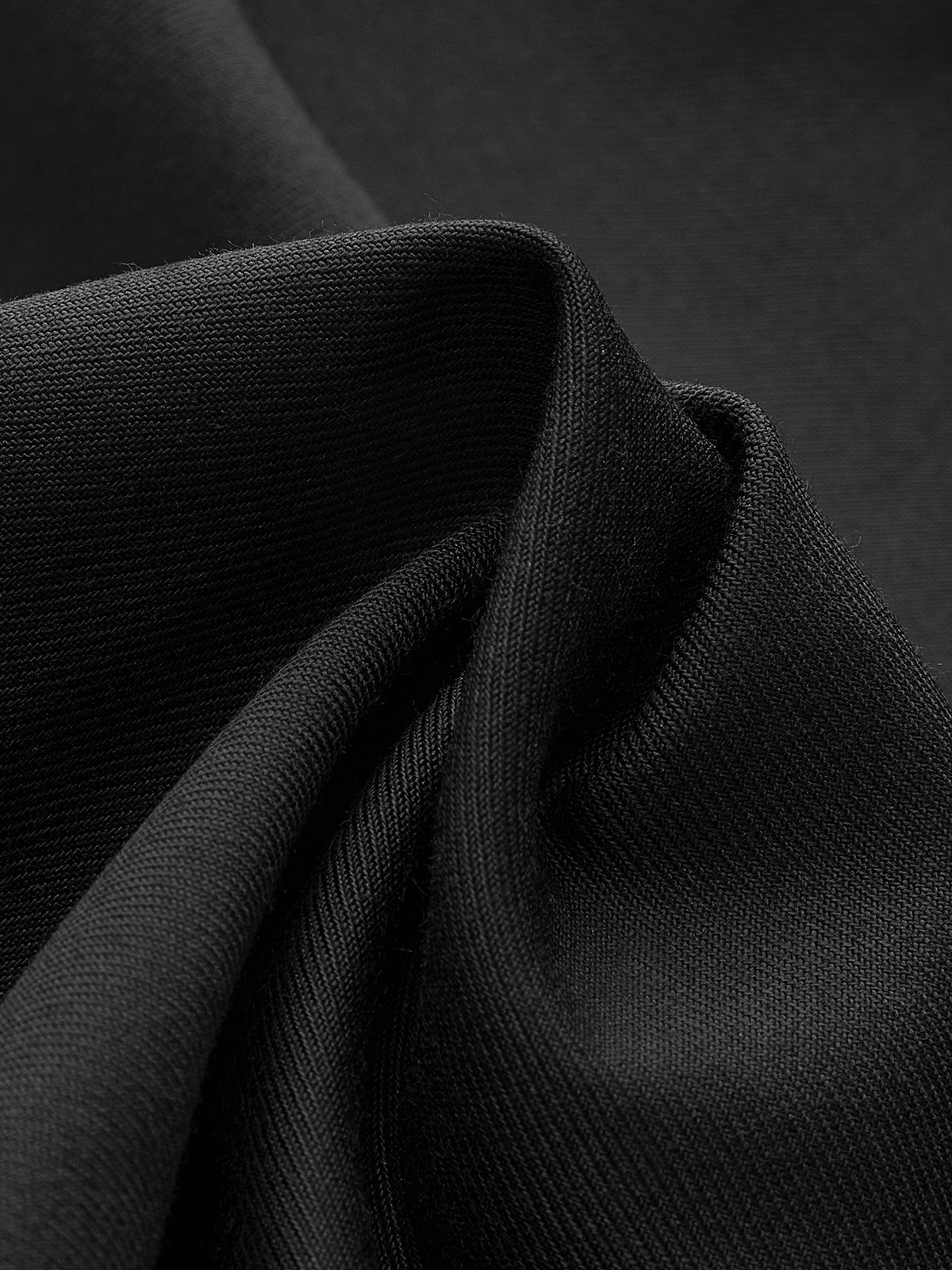 Valentina – Eleganckie spodnie garniturowe z asymetryczną klapą i szeroką nogawką