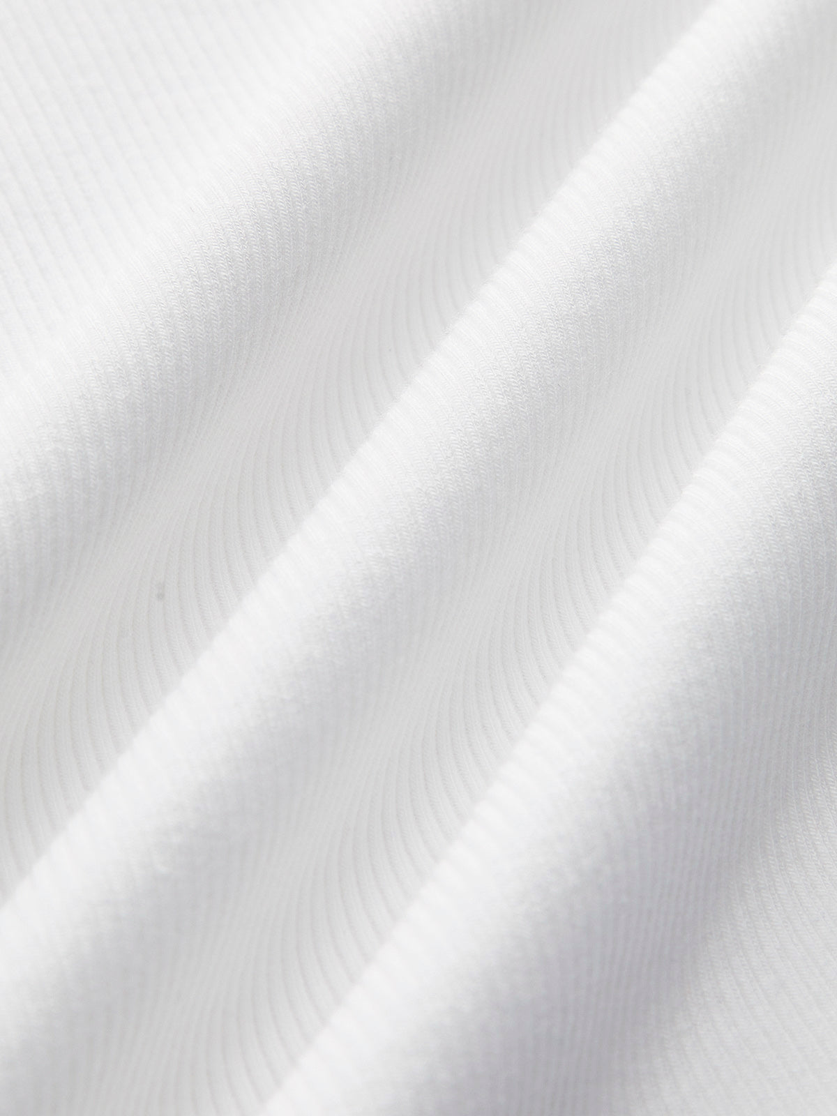 Inés – Krótki top bez rękawów o przylegającym kroju