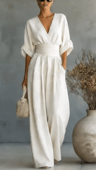 Annemarie – Elegant Deep V-neck Jumpsuit - Image 1