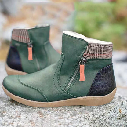 Grüne Damenstiefeletten mit Reißverschluss, rutschfeste Sohle, bequemes Design, ideal für Herbstmode. Hochwertige Materialien, stilvoll und praktisch.