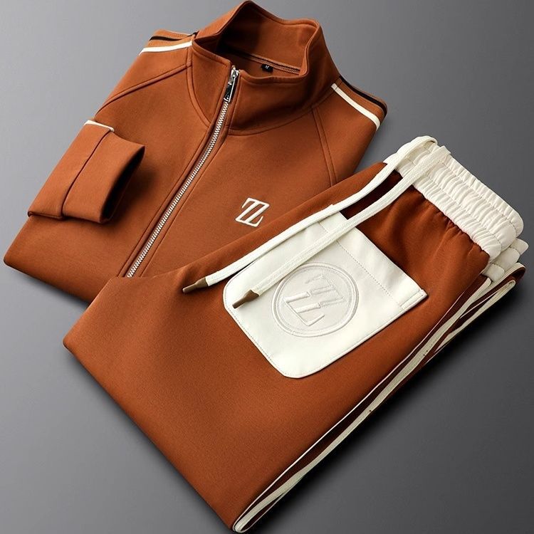 Dres damski z kurtką i spodniami, sportowy styl z detalami - 1 - Livia-Moda